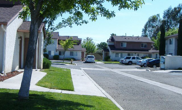 Image of street next to apartments